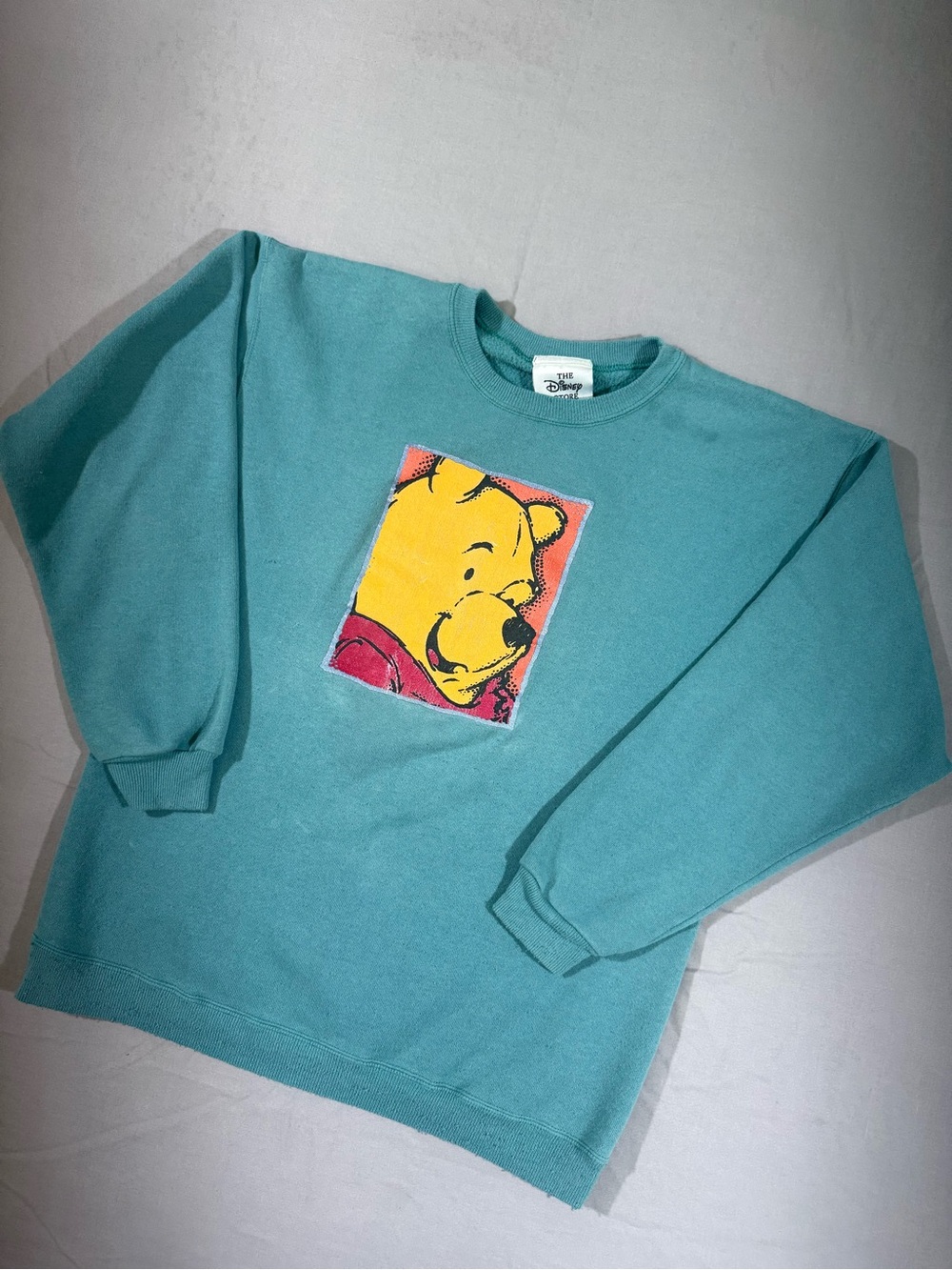 Vintage Disney Teal Crewneck Sweatshirt with Yellow Winnie the Pooh Graphic